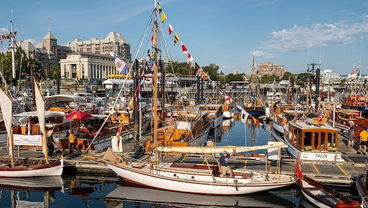 Classic wooden boats moored at Victoria's Inner Harbour during the Classic Boat Festival