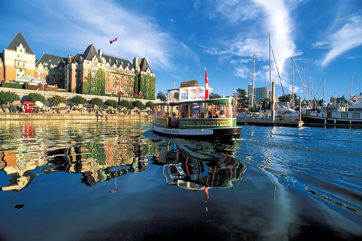 Victoria Harbour Ferry crossing the Inner Harbour with the Fairmont Empress Hotel in the background